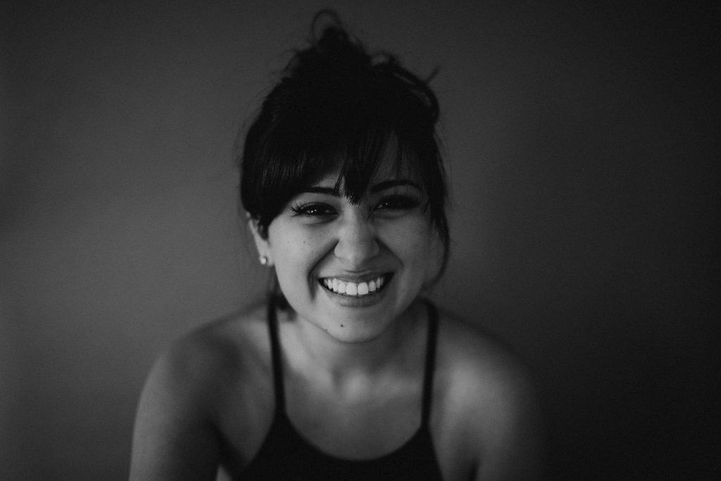 Photo by Brittani Burns smirking woman